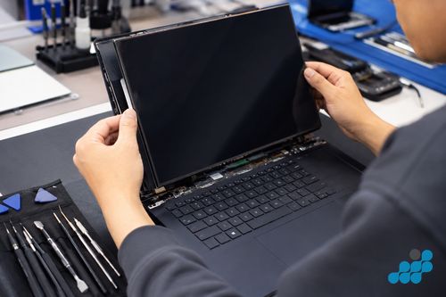 celltech technician replacing an Asus ZenBook OLED screen