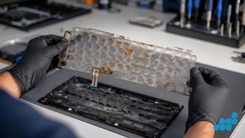 corroded Dell keyboard membrane after a liquid spill on the celltech bench