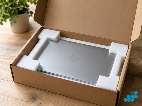 celltech technician separating an Inspiron screen assembly on the repair bench