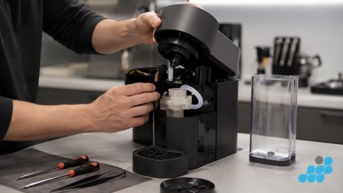 Nespresso Vertuo Next repair — capsule mechanism and pump assembly