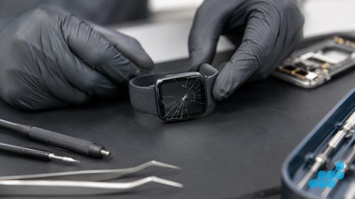 cracked Fitbit screen awaiting replacement