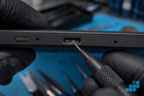 Debris inside a Kindle USB-C charging port — a common cause of charging failure