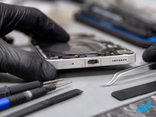 Damaged USB-C charging port on a Nothing Phone with bent contact pins