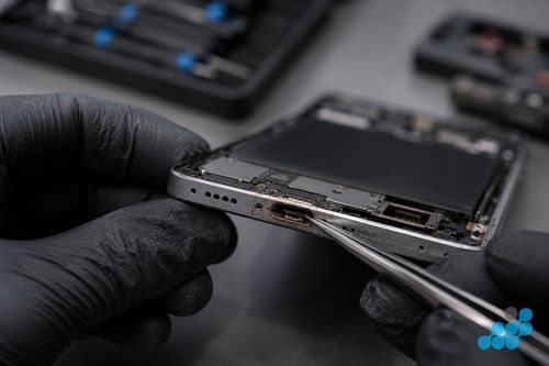 Damaged SuperVOOC USB-C port on a OnePlus phone with worn contacts